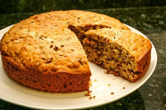 chocolate chip cake with a slice cut