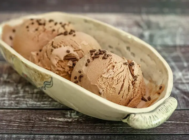 homemade chocolate ice cream in a pottery serving dish.