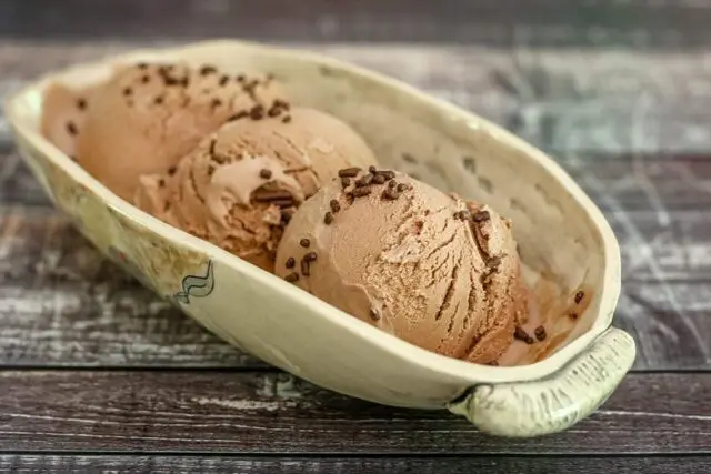 homemade chocolate ice cream in a pottery serving dish.