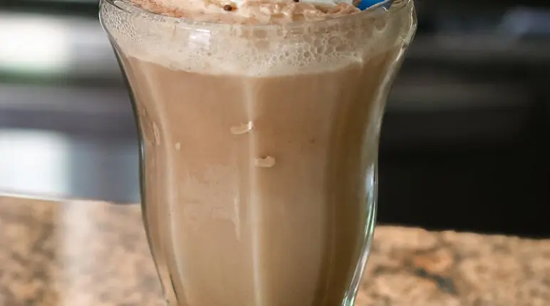 Delicious ice cream soda with whipped cream and sprinkles.