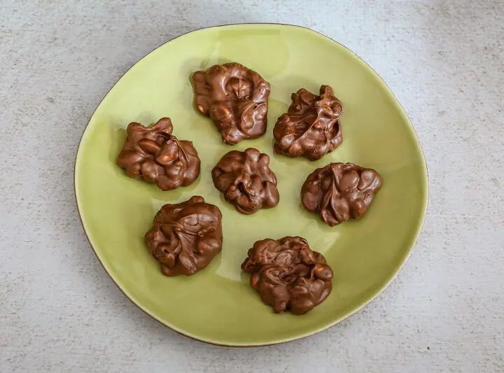 chocolate peanut clusters on a plate