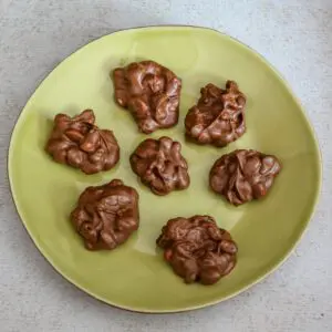 chocolate peanut clusters on a plate