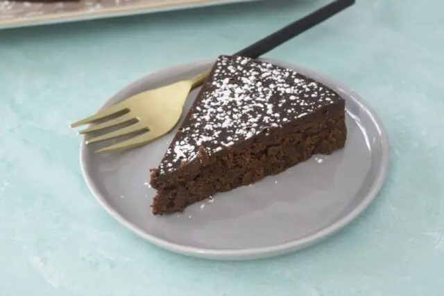 A wedge of chocolate truffle torte