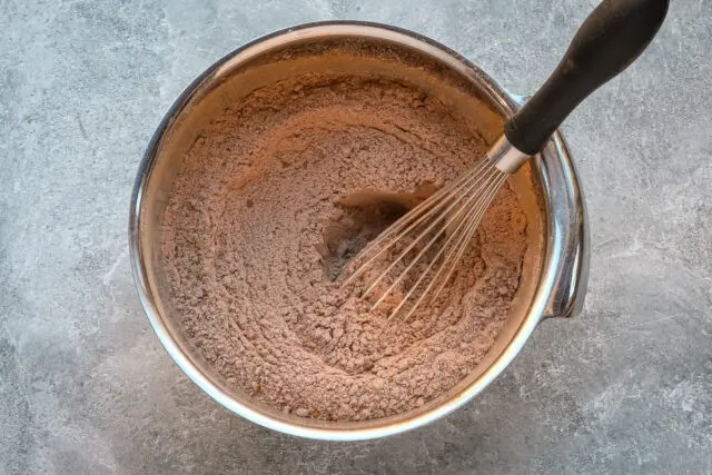 Chocolate zucchini muffin prep: flour mixture.