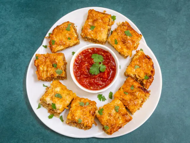 Platter of chorizo quiche squares.