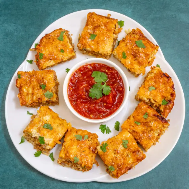 Platter of chorizo quiche squares.