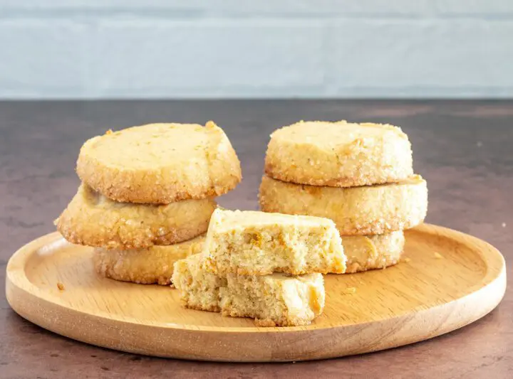 citrus cardamom sable cookies on a plate