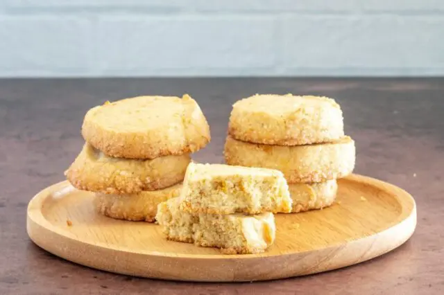 citrus cardamom sable cookies on a plate