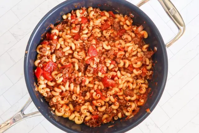 american chop suey preparation in a skillet