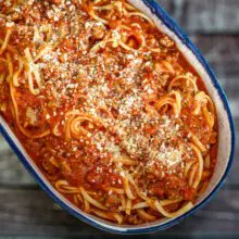 bolognese with spaghetti and parmesan cheese