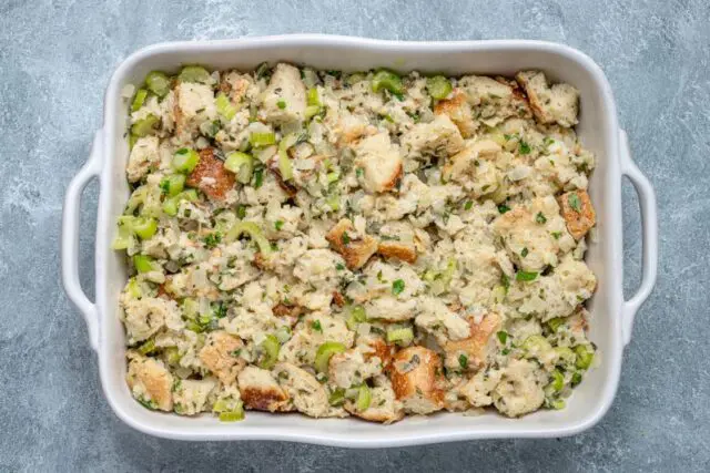 Spread the stuffing ingredients in the baking dish