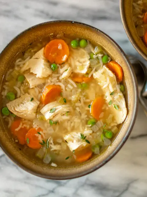 a bowl of chicken and rice soup