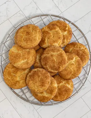 snickerdoodle cookies on a cooling rack