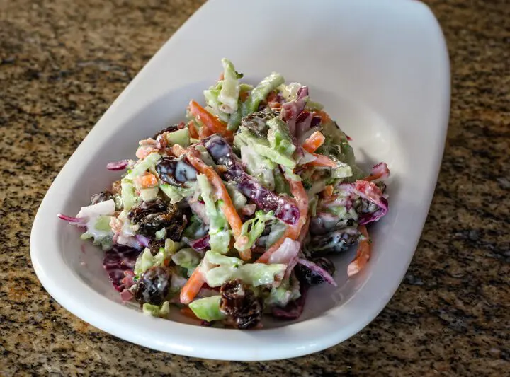 colorful coleslaw with mayonnaise and sour cream dressing