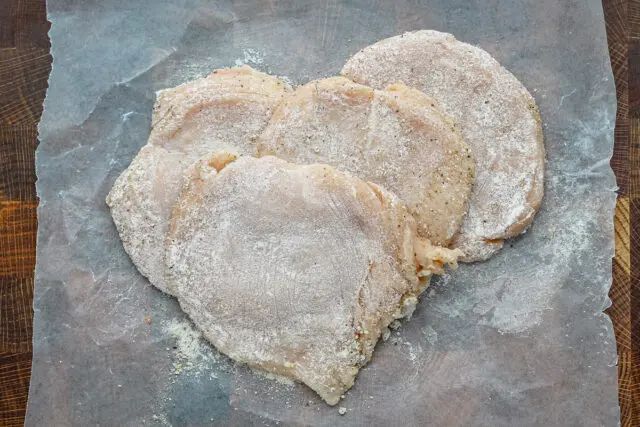 Company chicken preparation with Italian dressing and flour.