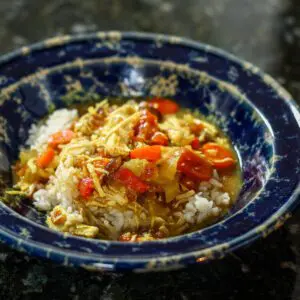 country captain chicken in a bowl on rice