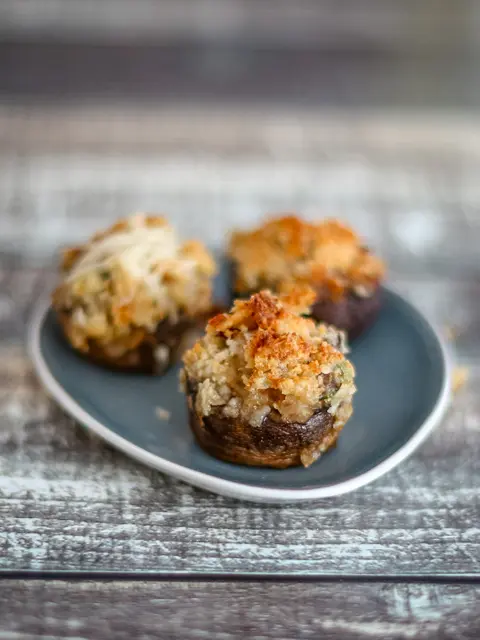 stuffed mushrooms on appetizer plate