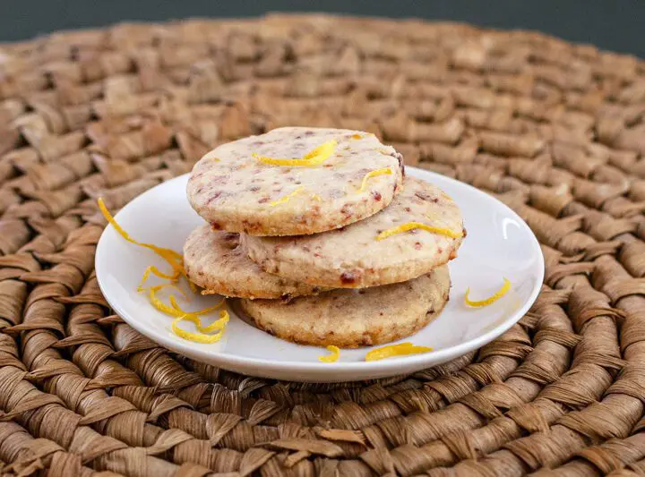 cranberry orange shortbread cookies on a plate