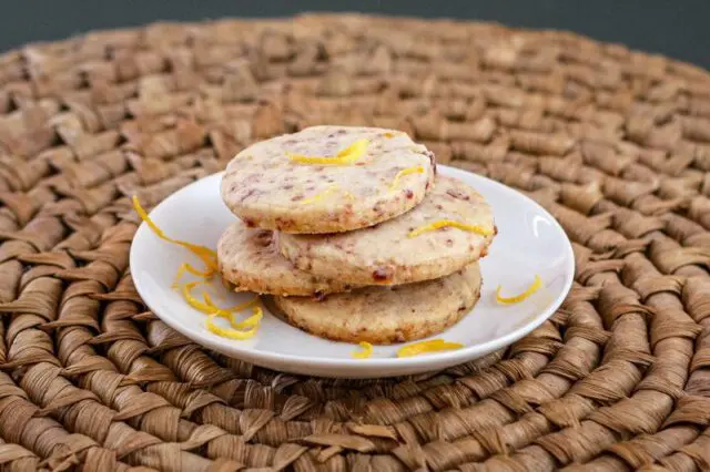 cranberry orange shortbread cookies on a plate