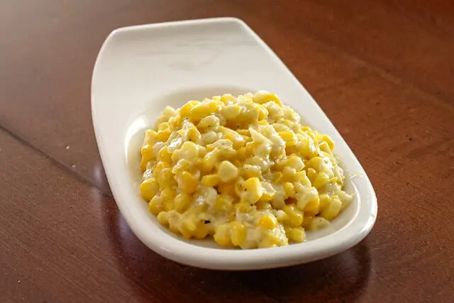 cream style corn in a small serving dish