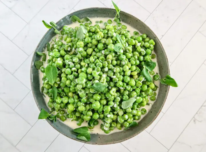 creamed peas in a serving bowl