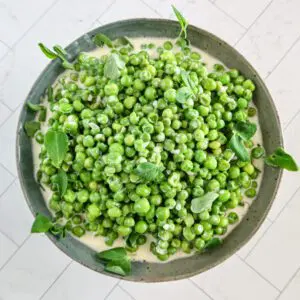 creamed peas in a serving bowl