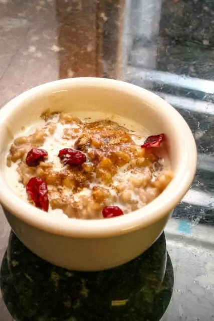 overnight oatmeal in a small bowl with dried cranberries