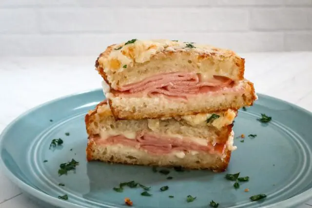 closeup of a croque monsieur sandwich on a plate 