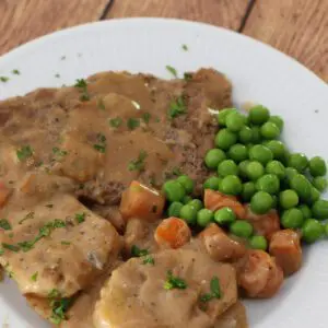 dinner plate with cube steaks with mushrooms and gravy