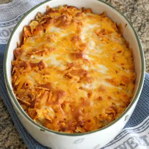 a tex mex dorito casserole baked, in the baking dish