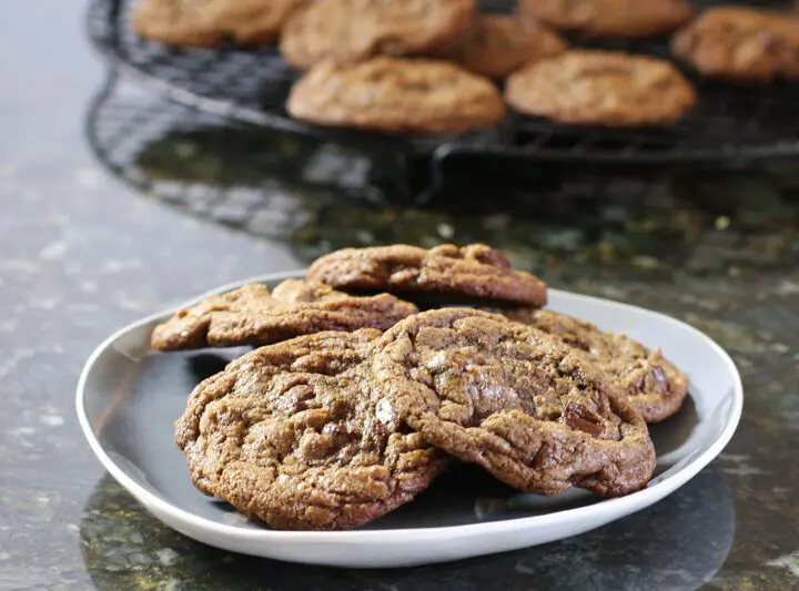 plate with chewy double chocolate chip cookies