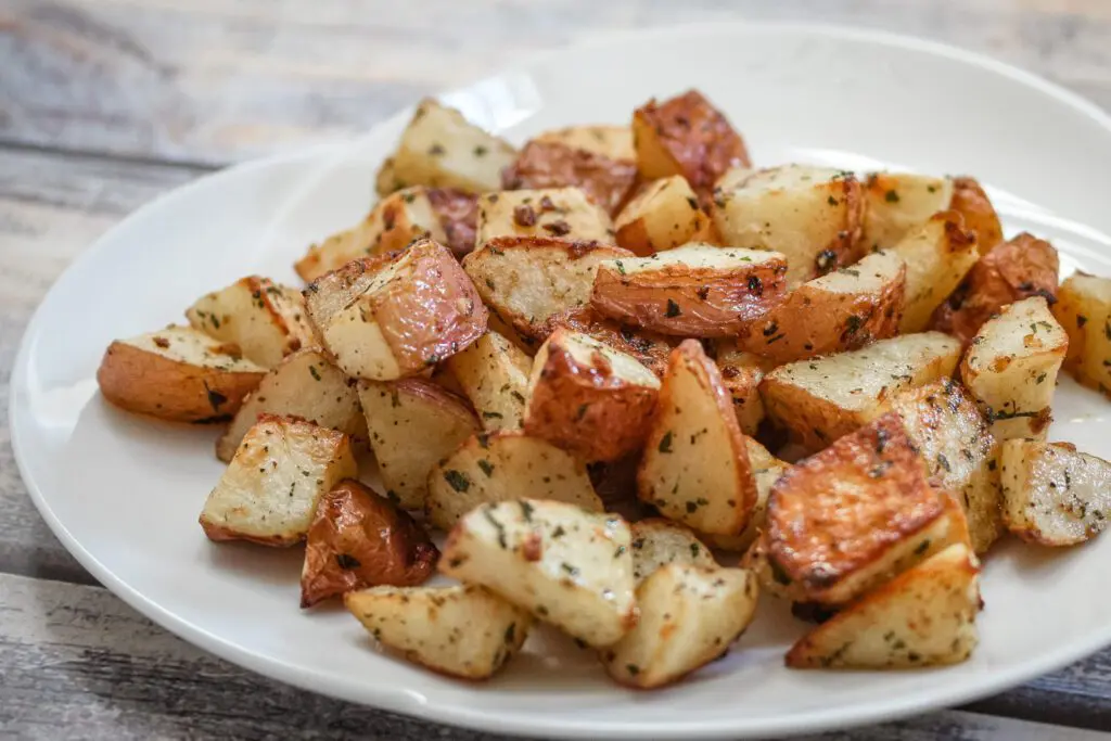 roasted potatoes on a large serving plate