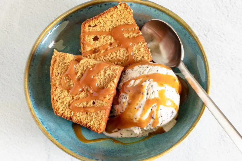 homemade caramel sauce drizzled over ice cream and pound cake