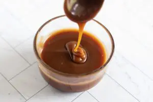 homemade caramel sauce in a jar