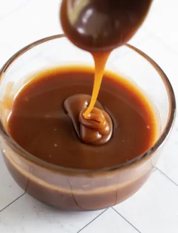 homemade caramel sauce in a jar