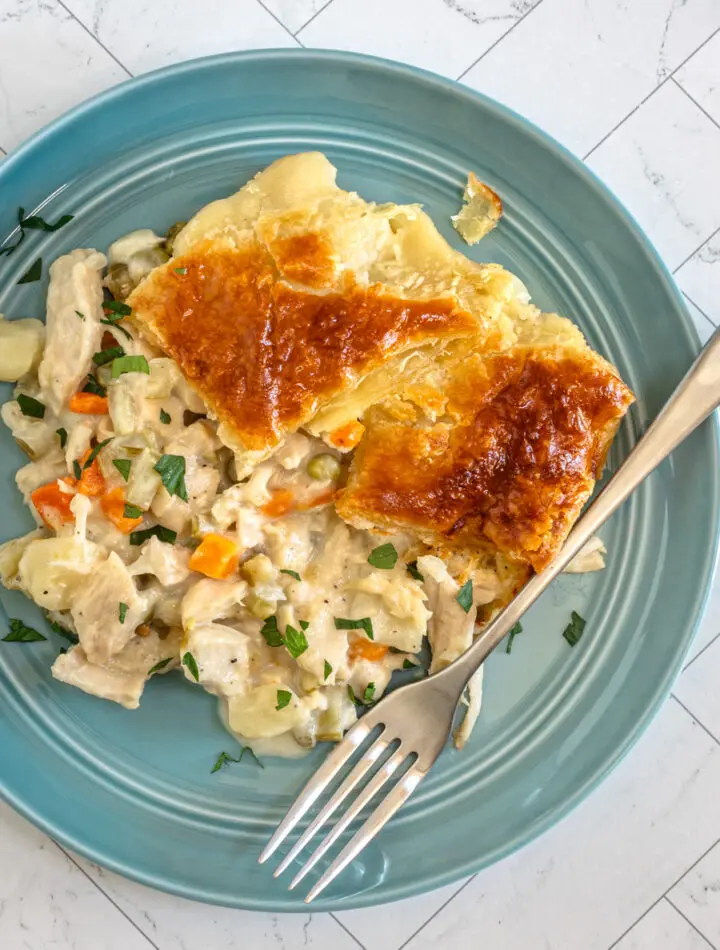 Chicken pot pie with puff pastry crust.