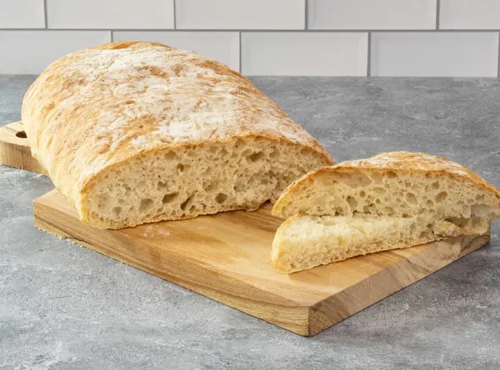 homemade ciabatta bread on a cutting board