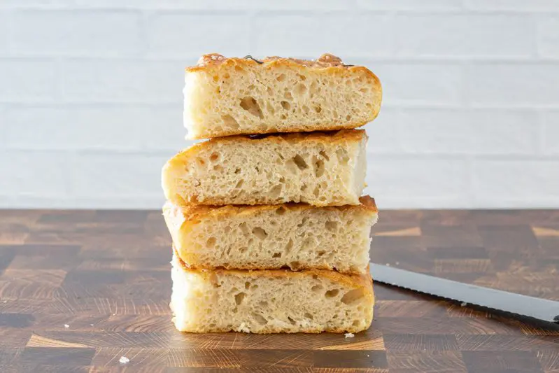 airy no knead focaccia slices stacked