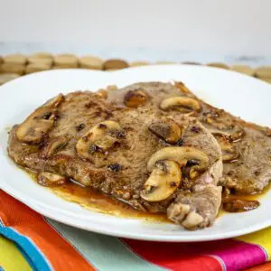 steak diane with mushrooms and savory sauce