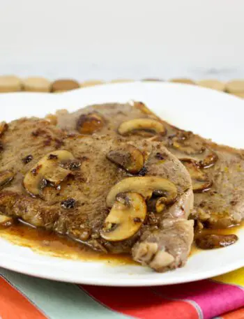 Steak Diane with sauce on a serving platter