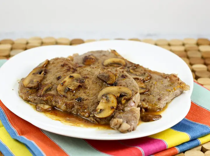 Steak Diane with sauce on a serving platter