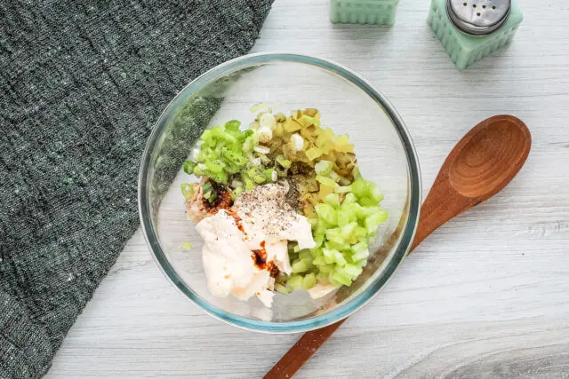 The ingredients for our elevated tuna melt are combined in a medium bowl.