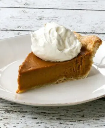 bourbon pumpkin pie with whipped cream