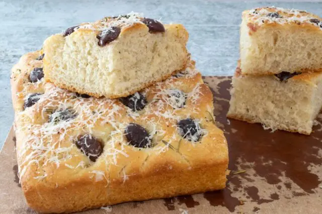 olive focaccia with rosemary and cheese, ready to eat