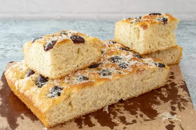 olive focaccia on a cutting board