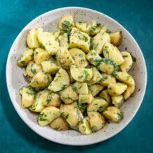 serving bowl of french potato salad