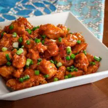 serving bowl with general tso's chicken