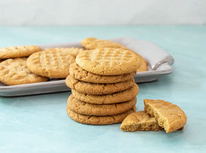 A stack of gluten-free peanut butter cookies.