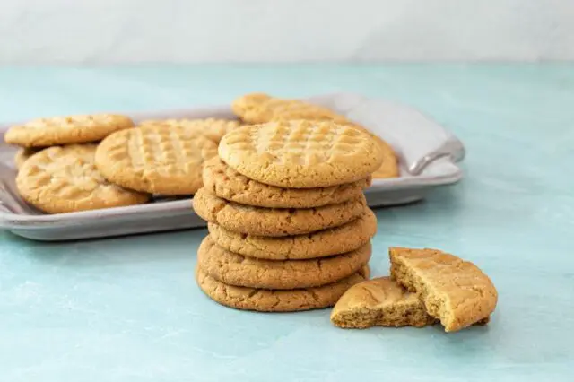 A stack of gluten-free peanut butter cookies.