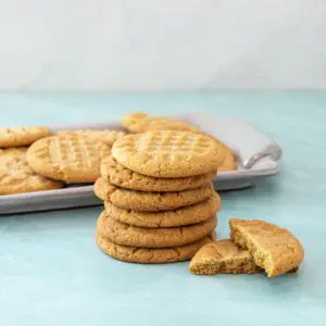 A stack of gluten-free peanut butter cookies.